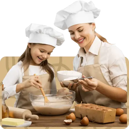 Mãe cozinhando com a filha